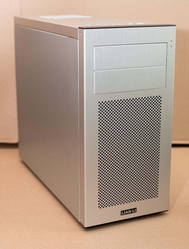 A silver case with a large ventilation grid on the front.
