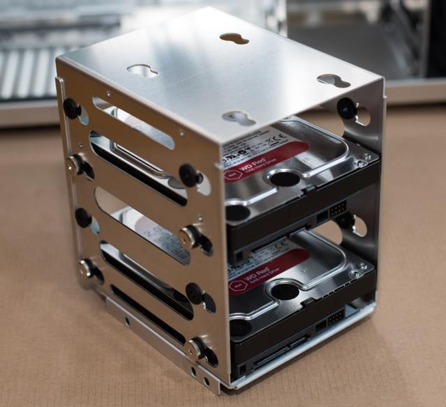 A hard disk cage with two HDD.